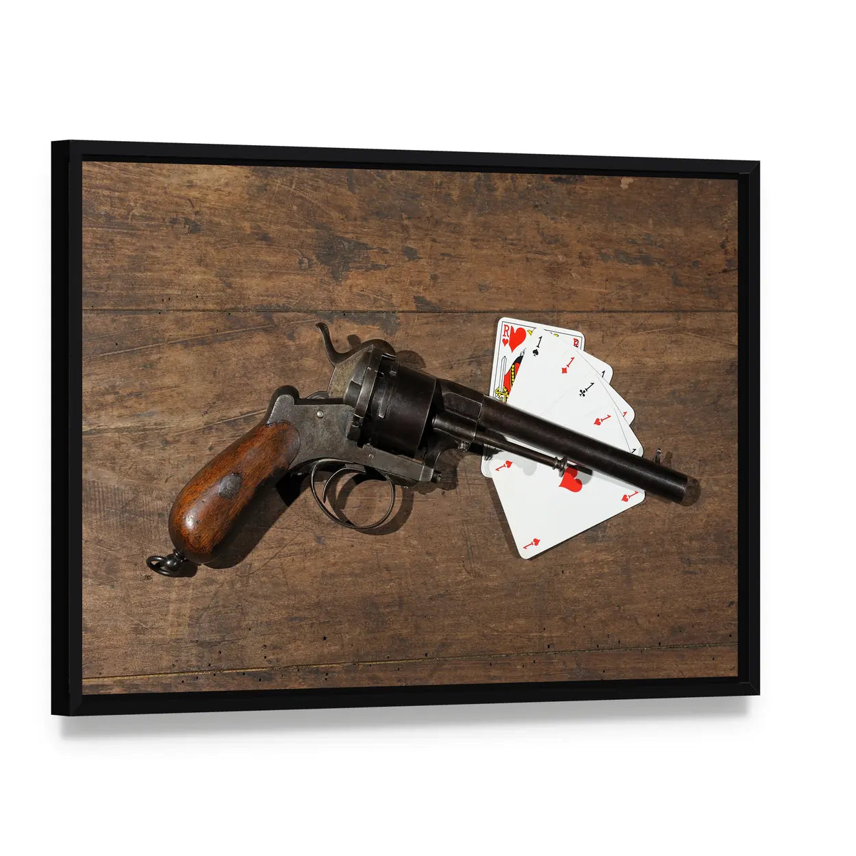Antique Revolver and Playing Cards on Wooden Table Canvas Wall Art, framed canvas in a black floater frame, angled product view