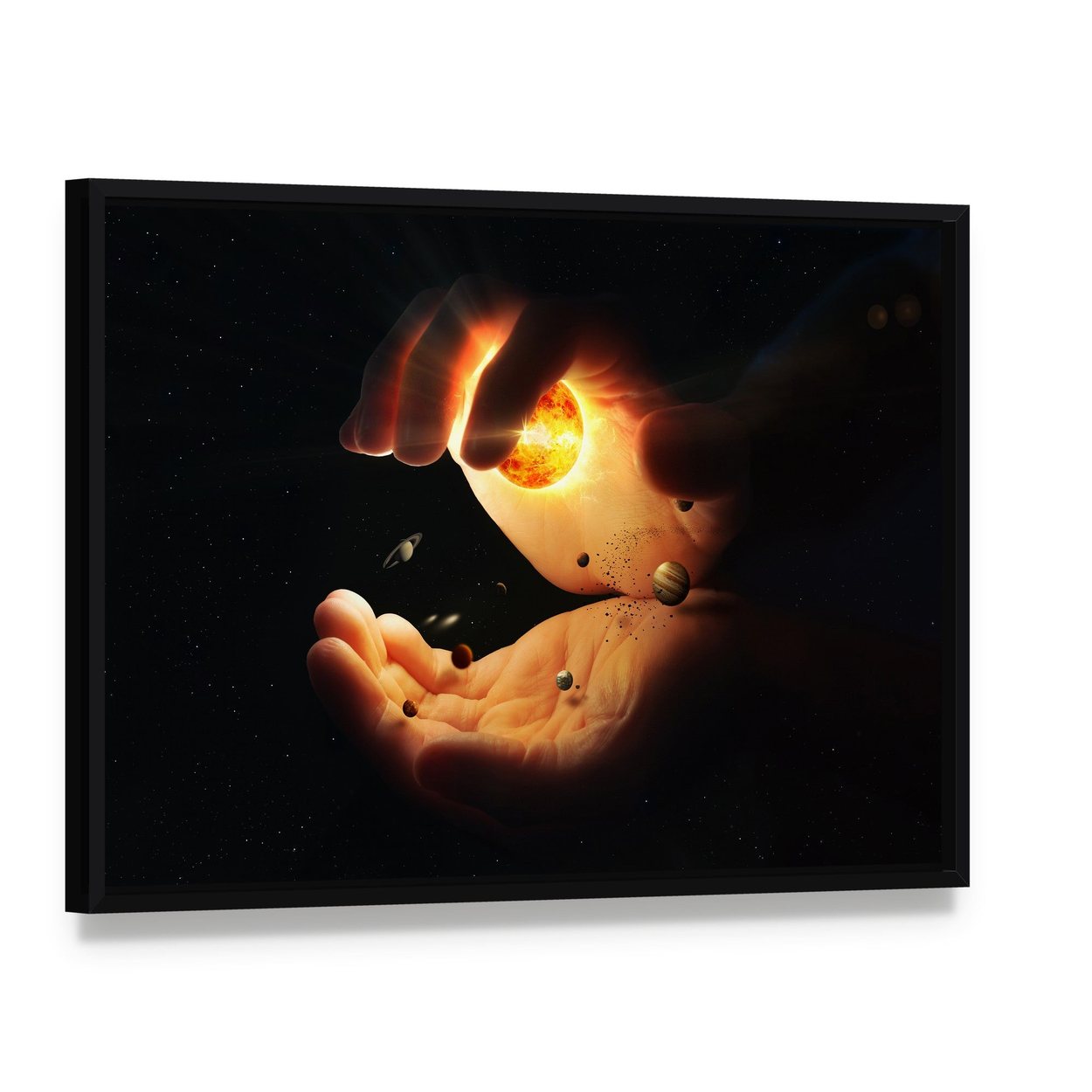 Solar System Held in Hands Canvas Wall Art, framed canvas in a black floater frame, angled product view