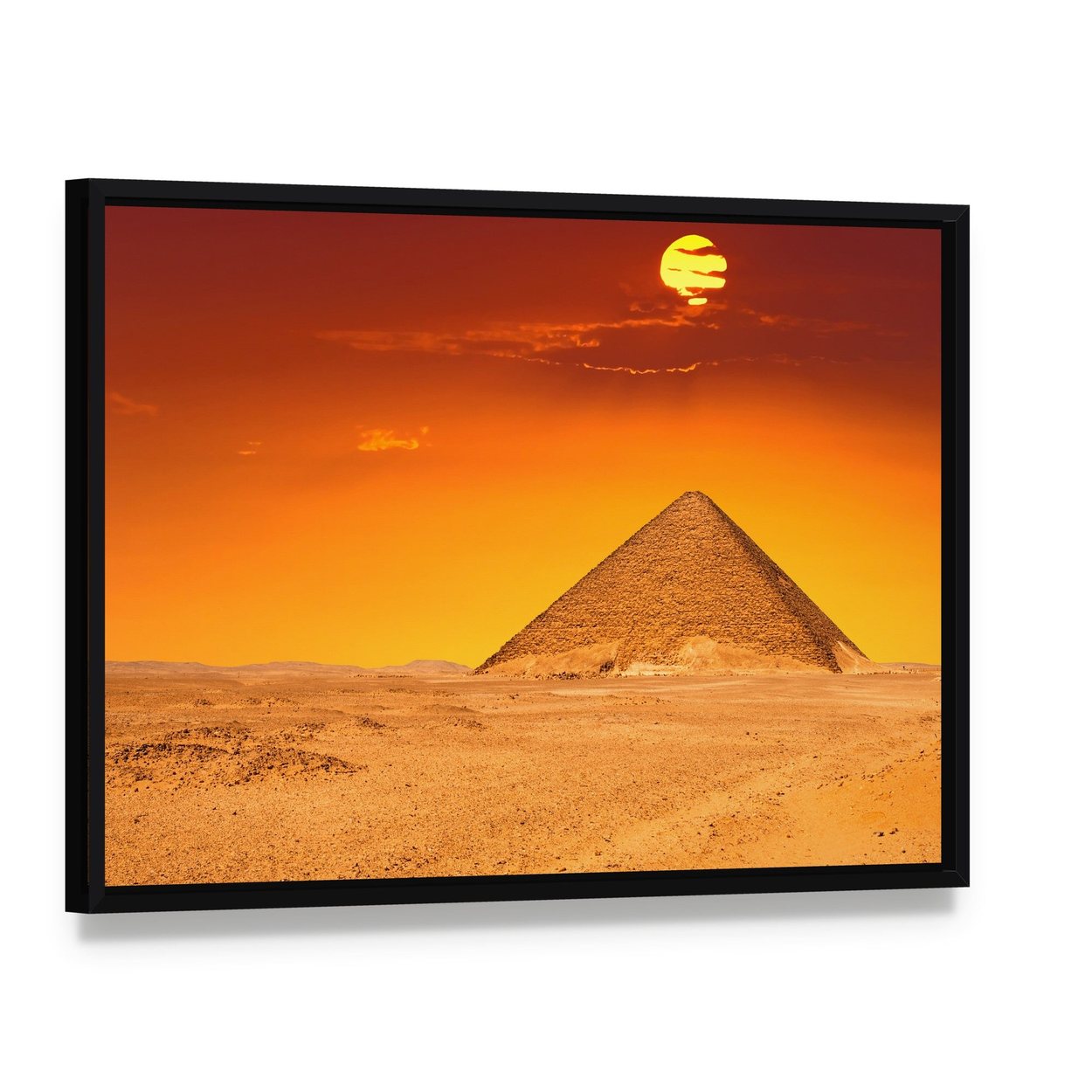 Egyptian Pyramid Under Red Sky Canvas Wall Art, framed canvas in a black floater frame, angled product view
