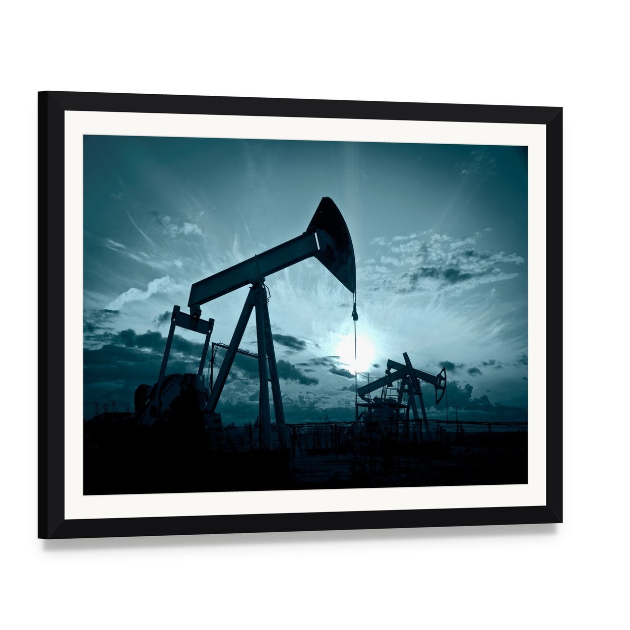 Silhouetted Oil Pumps at Sunset Canvas Wall Art, framed print with white mat and black frame, angled product view