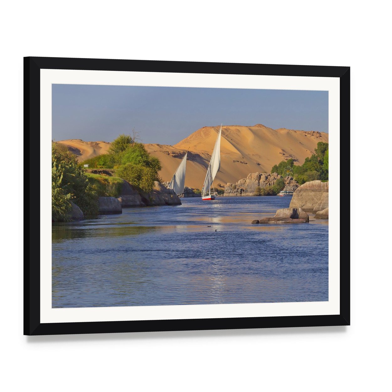 Sailing on the Serene Nile River Canvas Wall Art, framed print with white mat and black frame, angled product view