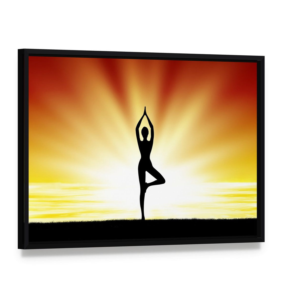 Woman Practicing Yoga at Sunset Canvas Wall Art, framed canvas in a black floater frame, angled product view
