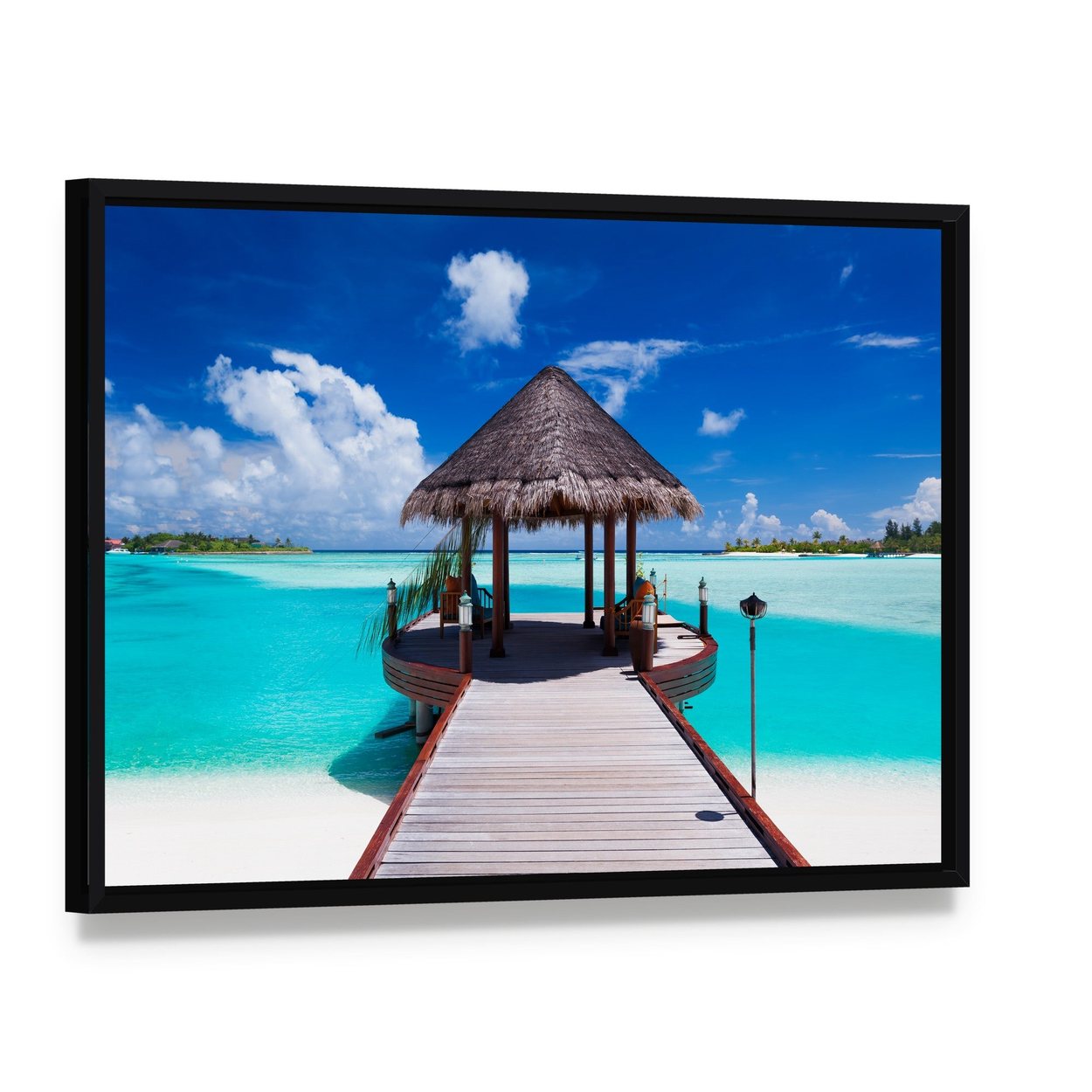 Pier with Ocean and Hut View Canvas Wall Art, framed canvas in a black floater frame, angled product view