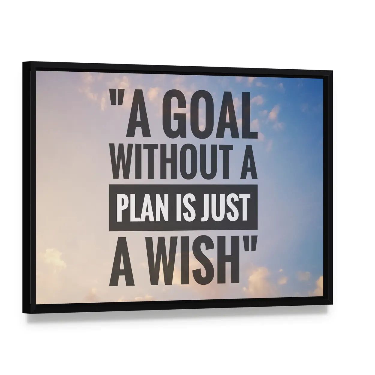 A Goal Without a Plan Is Just a Wish Canvas Wall Art, framed canvas in a black floater frame, angled product view