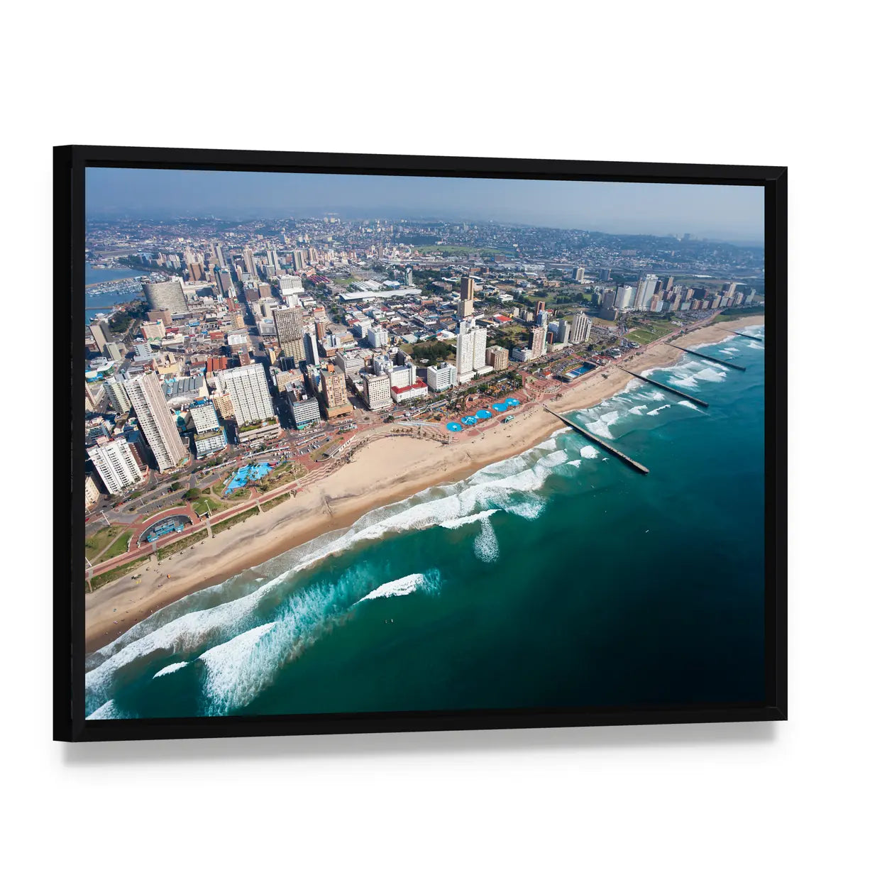 Durban Beach and City Skyline Canvas Wall Art, framed canvas in a black floater frame, angled product view
