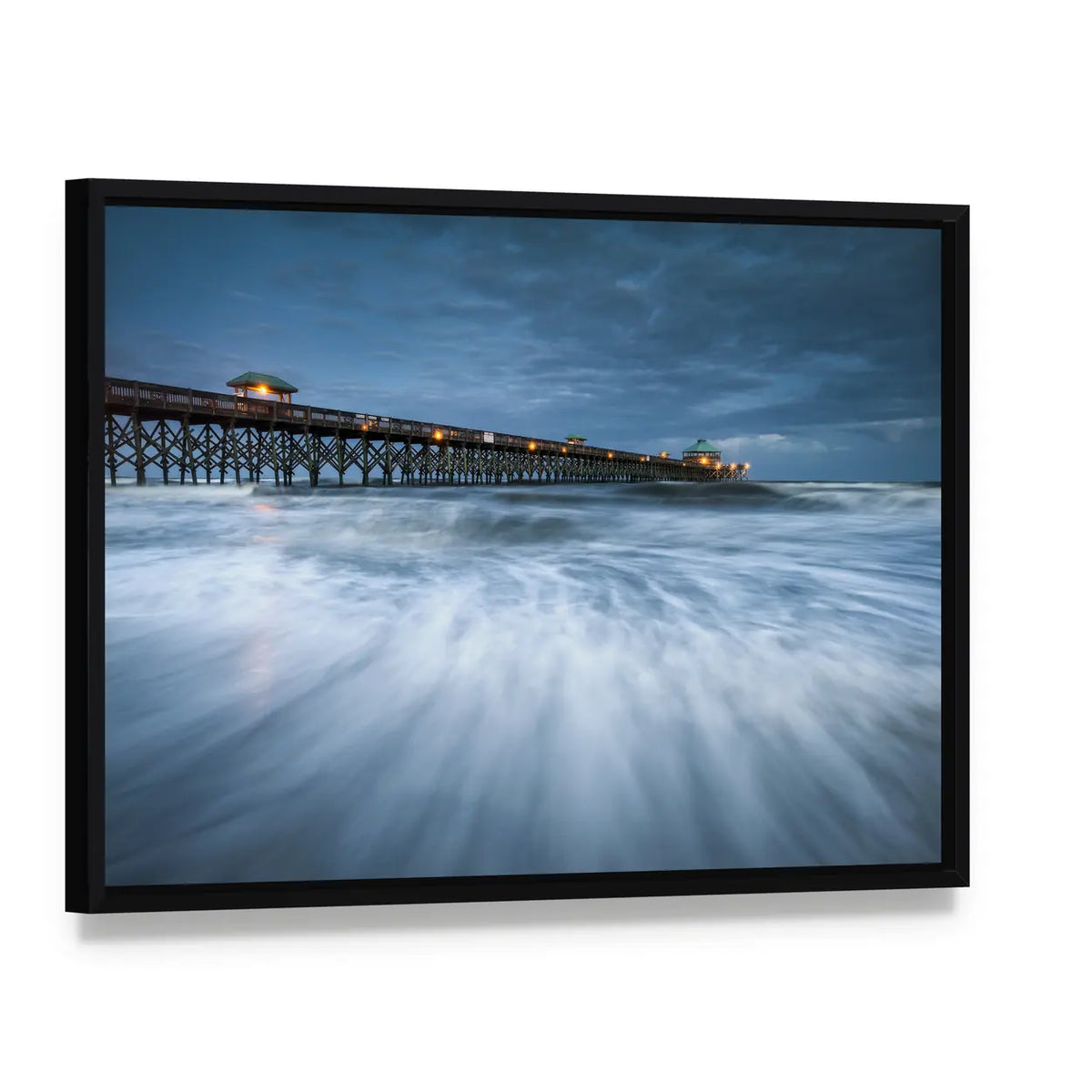 Folly Beach Pier at Night Canvas Wall Art, framed canvas in a black floater frame, angled product view