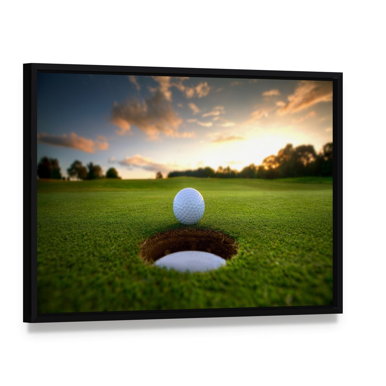 Golf Ball About to Fall Canvas Wall Art, framed canvas in a black floater frame, angled product view