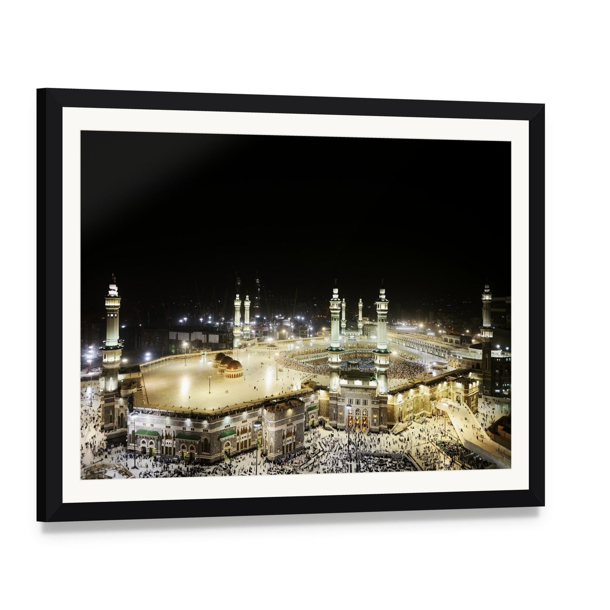 Illuminated Kaaba at Night Canvas Wall Art, framed print with white mat and black frame, angled product view