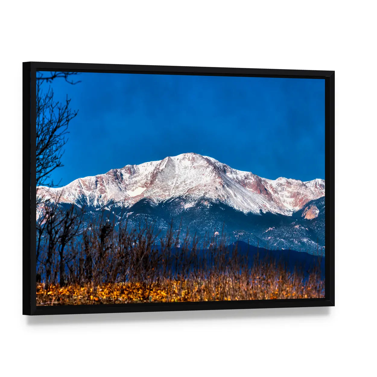Pikes Peak Snow-capped Mountain Canvas Wall Art, framed canvas in a black floater frame, angled product view