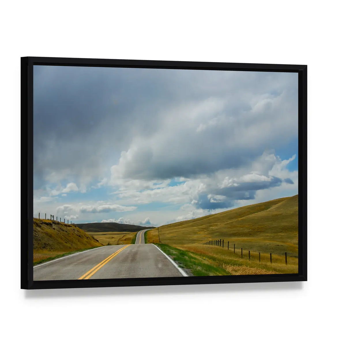 Driving On The Open Road In Big Sky Country Montana Canvas Wall Art, framed canvas in a black floater frame, angled product view