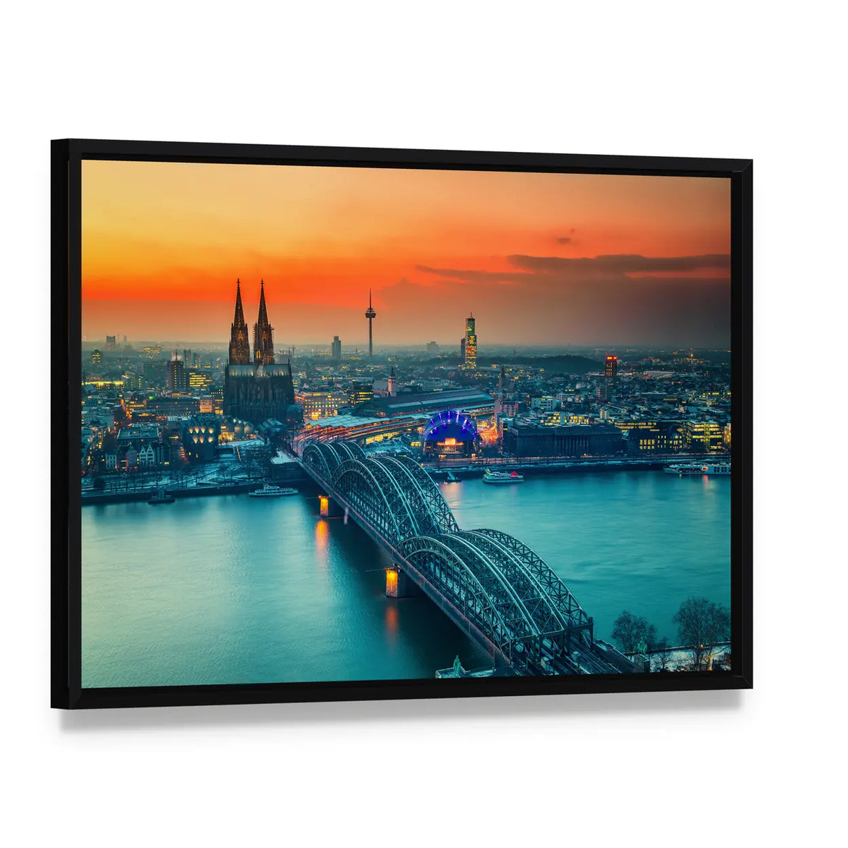 Cologne Cathedral And Hohenzollern Bridge At Night In Germany Canvas Wall Art, framed canvas in a black floater frame, angled product view