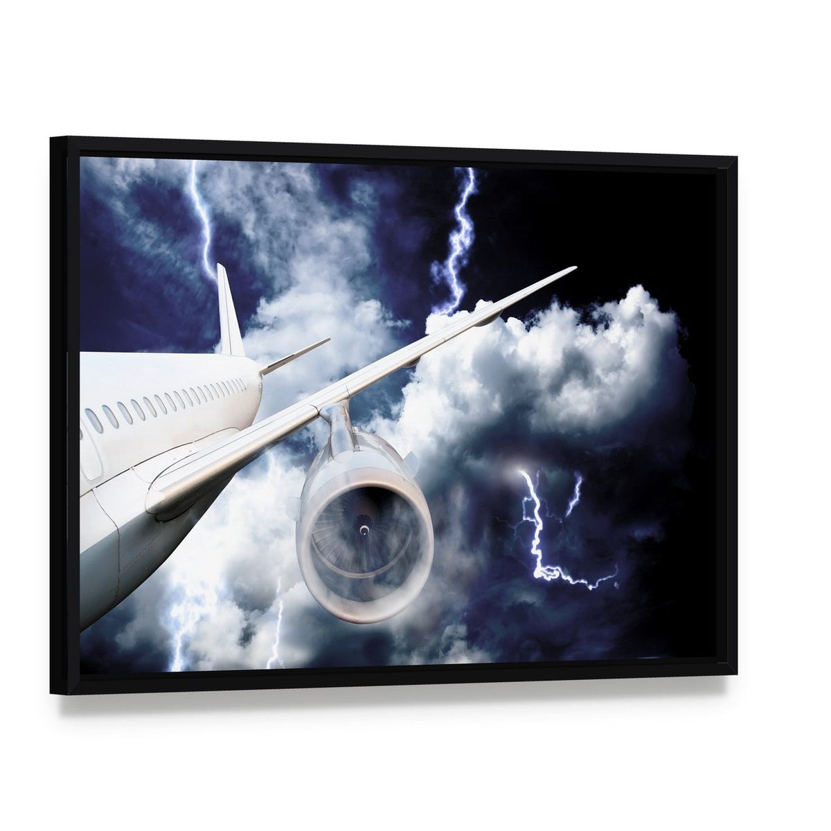 Airplane in Thunderstorm Canvas Wall Art, framed canvas in a black floater frame, angled product view