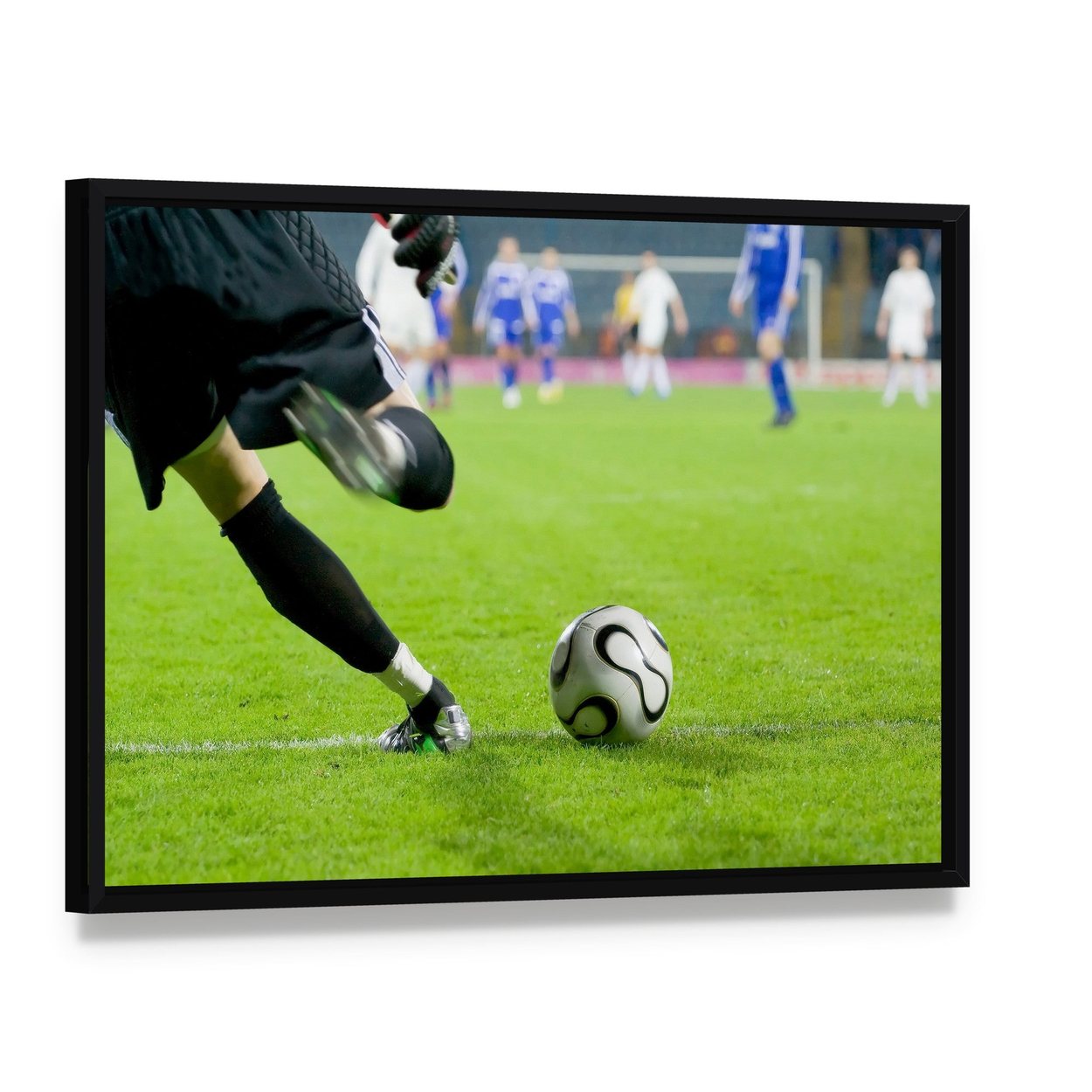 Football Goalkeeper Kick the Ball Canvas Wall Art, framed canvas in a black floater frame, angled product view