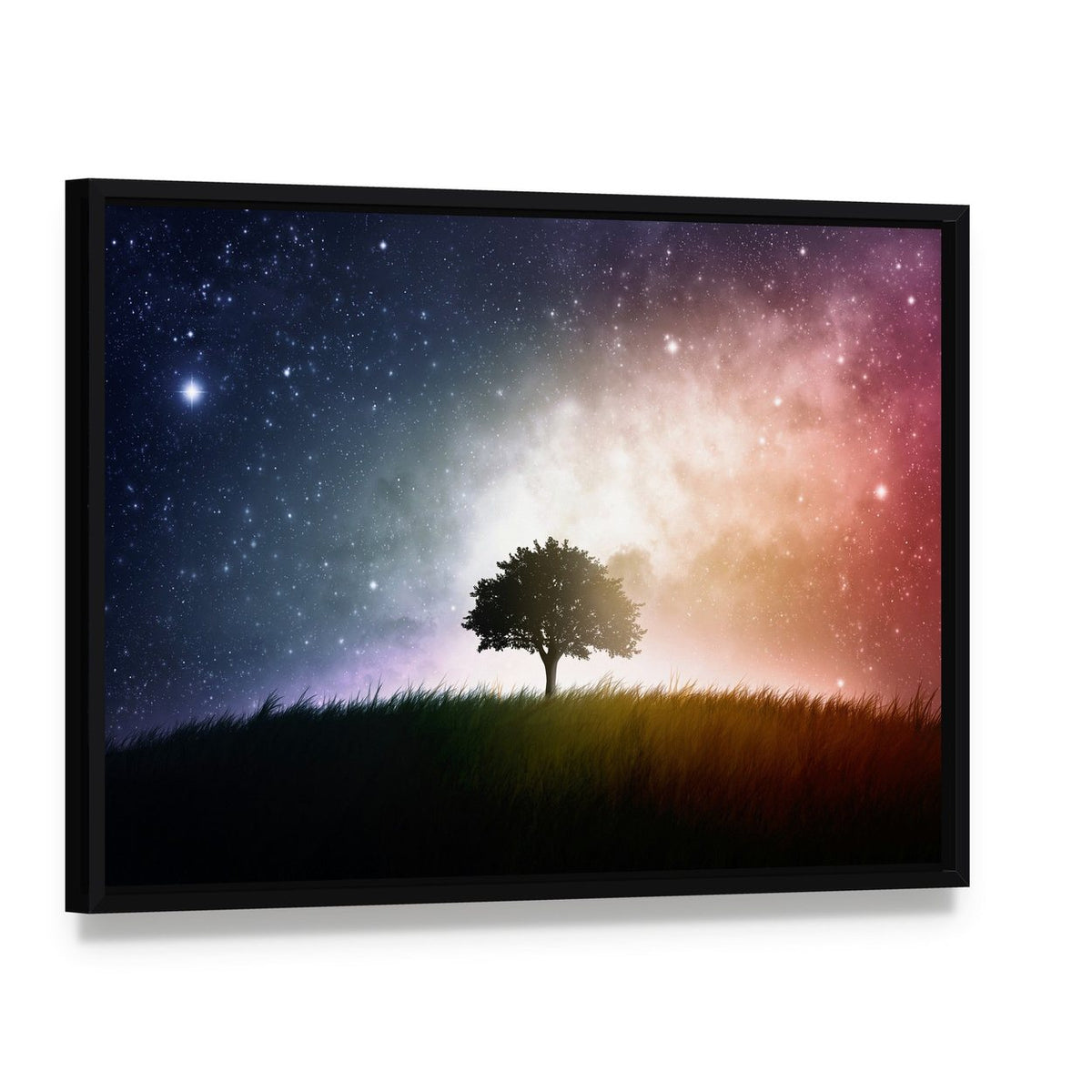 Star and Galaxies Behind the Tree Canvas Wall Art, framed canvas in a black floater frame, angled product view