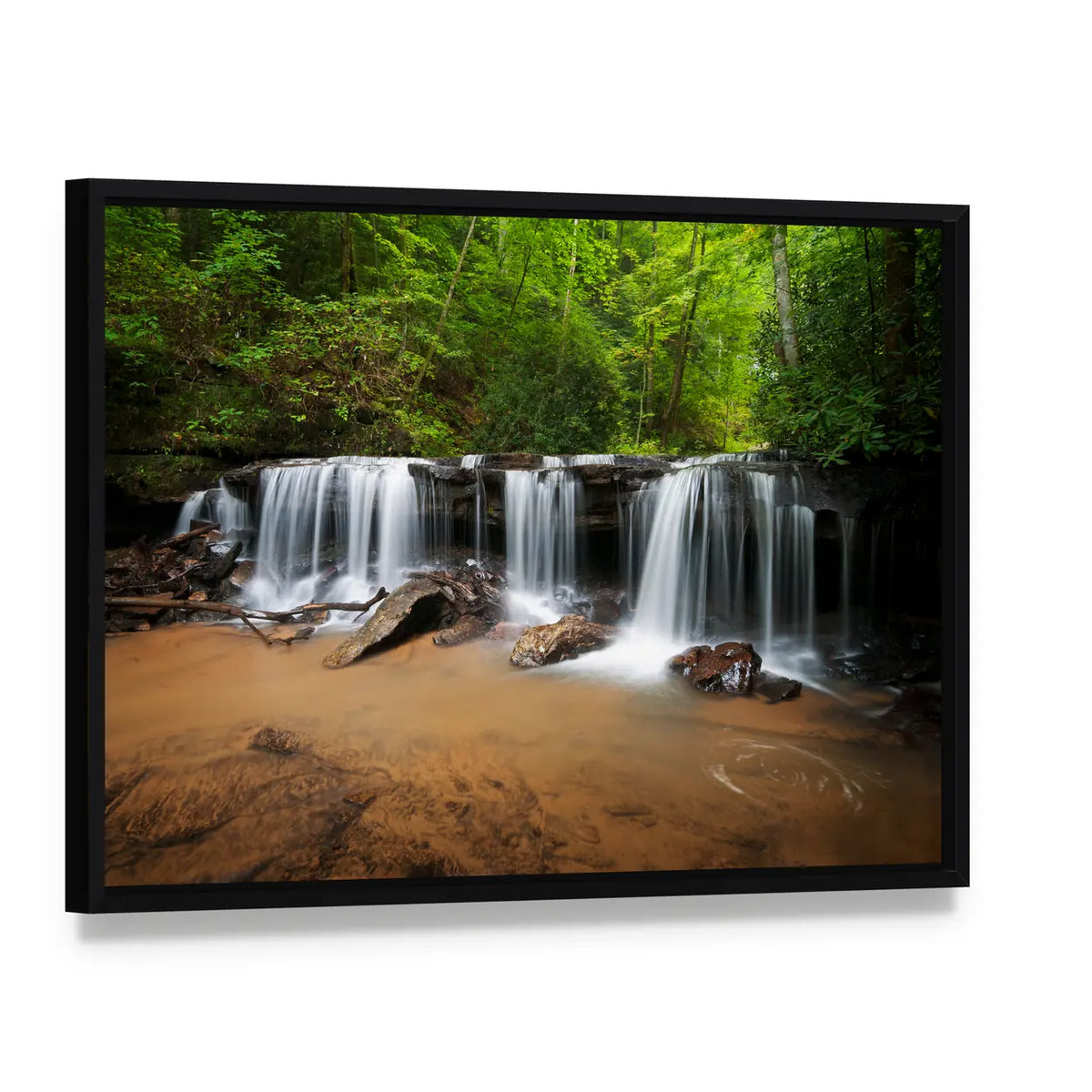 Peaceful Forest Waterfalls Canvas Wall Art, framed canvas in a black floater frame, angled product view