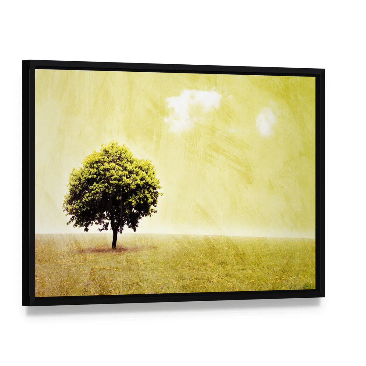 Lone Tree in Yellow Meadow Canvas Wall Art, framed canvas in a black floater frame, angled product view