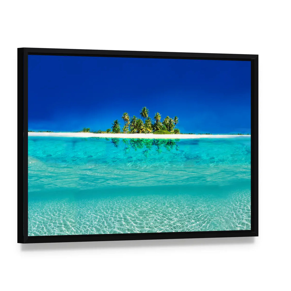 Tropical Island Reflection on the Sea Canvas Wall Art, framed canvas in a black floater frame, angled product view