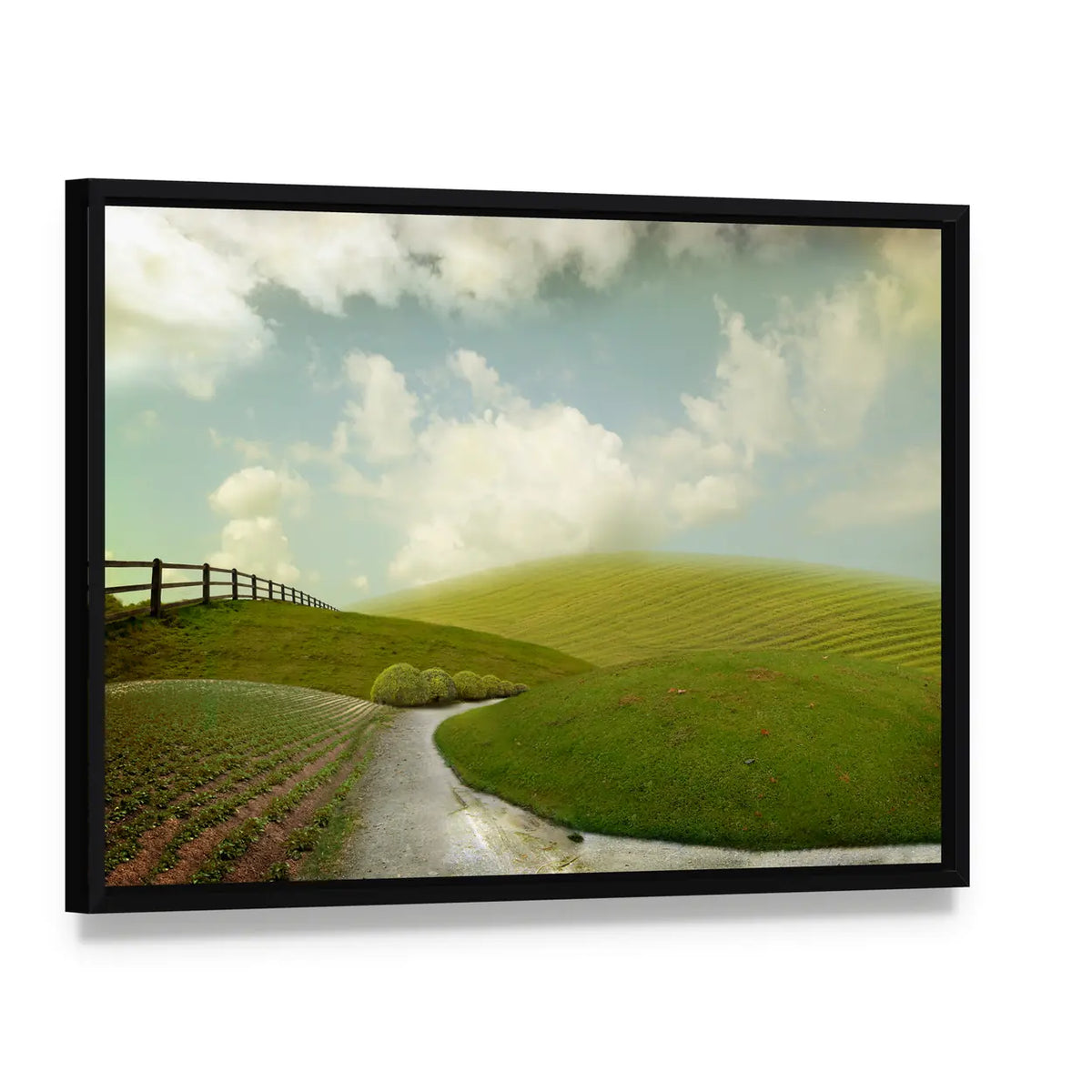 Winding Path Through Rolling Green Hills Canvas Wall Art, framed canvas in a black floater frame, angled product view