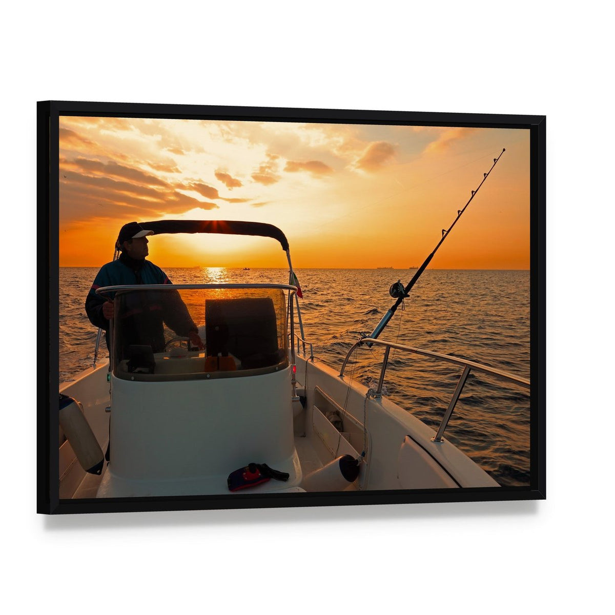 Fisherman with Boat in Ocean Canvas Wall Art, framed canvas in a black floater frame, angled product view