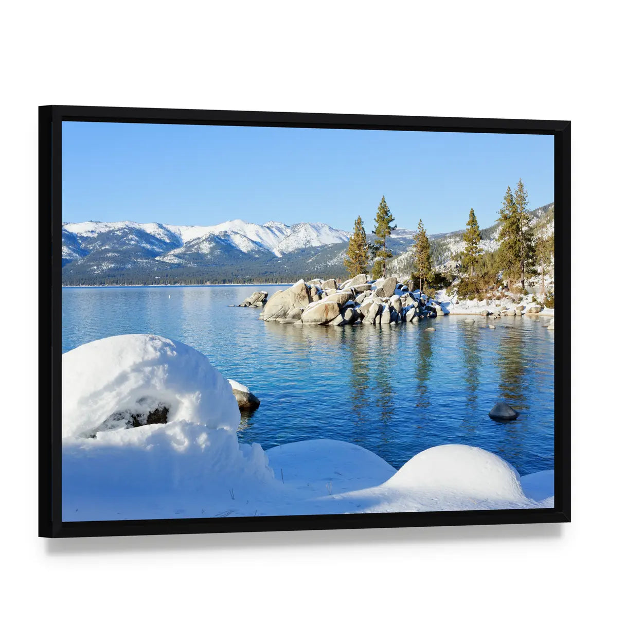Winter at Lake Tahoe Canvas Wall Art, framed canvas in a black floater frame, angled product view