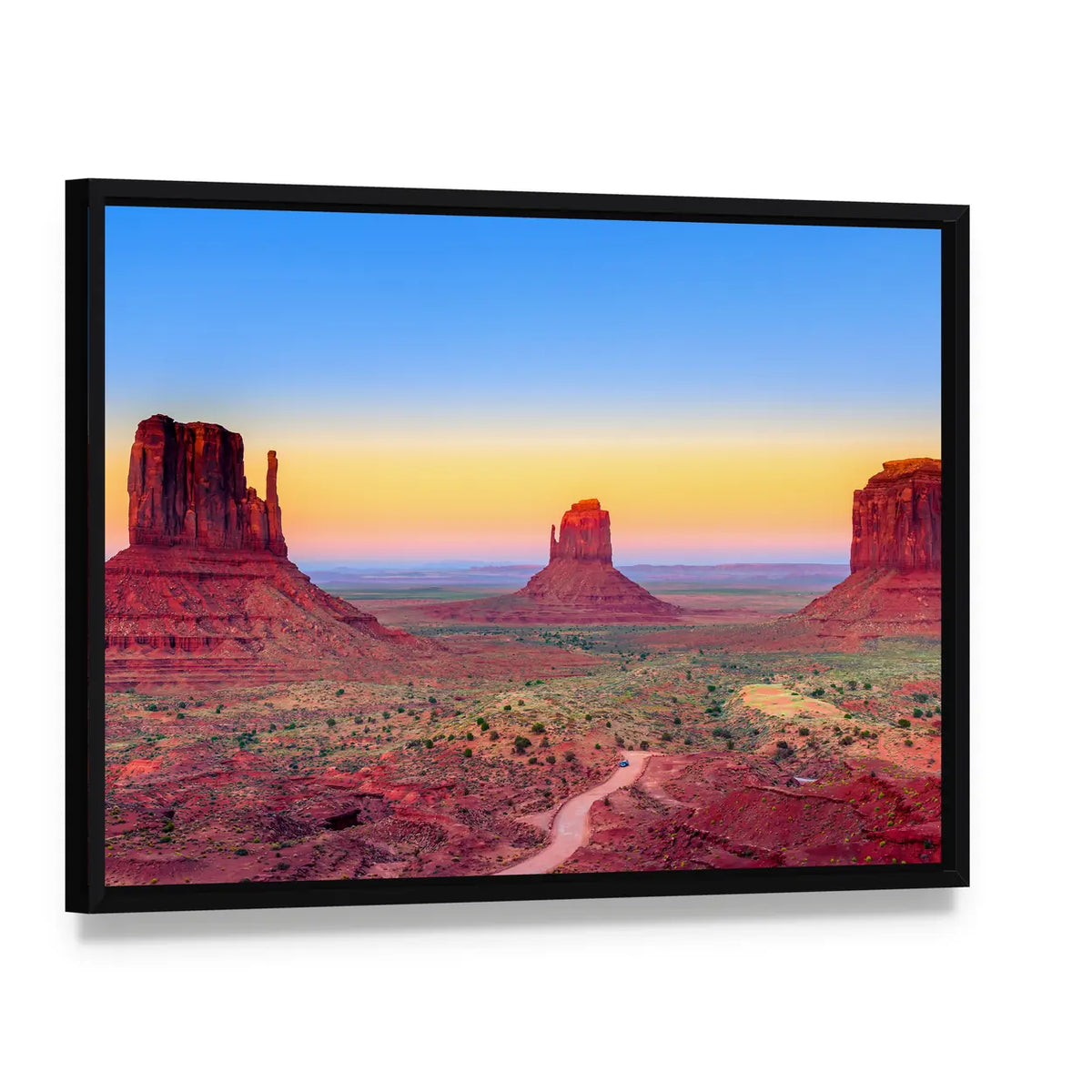 Sunset At Monument Valley In USA Canvas Wall Art, framed canvas in a black floater frame, angled product view