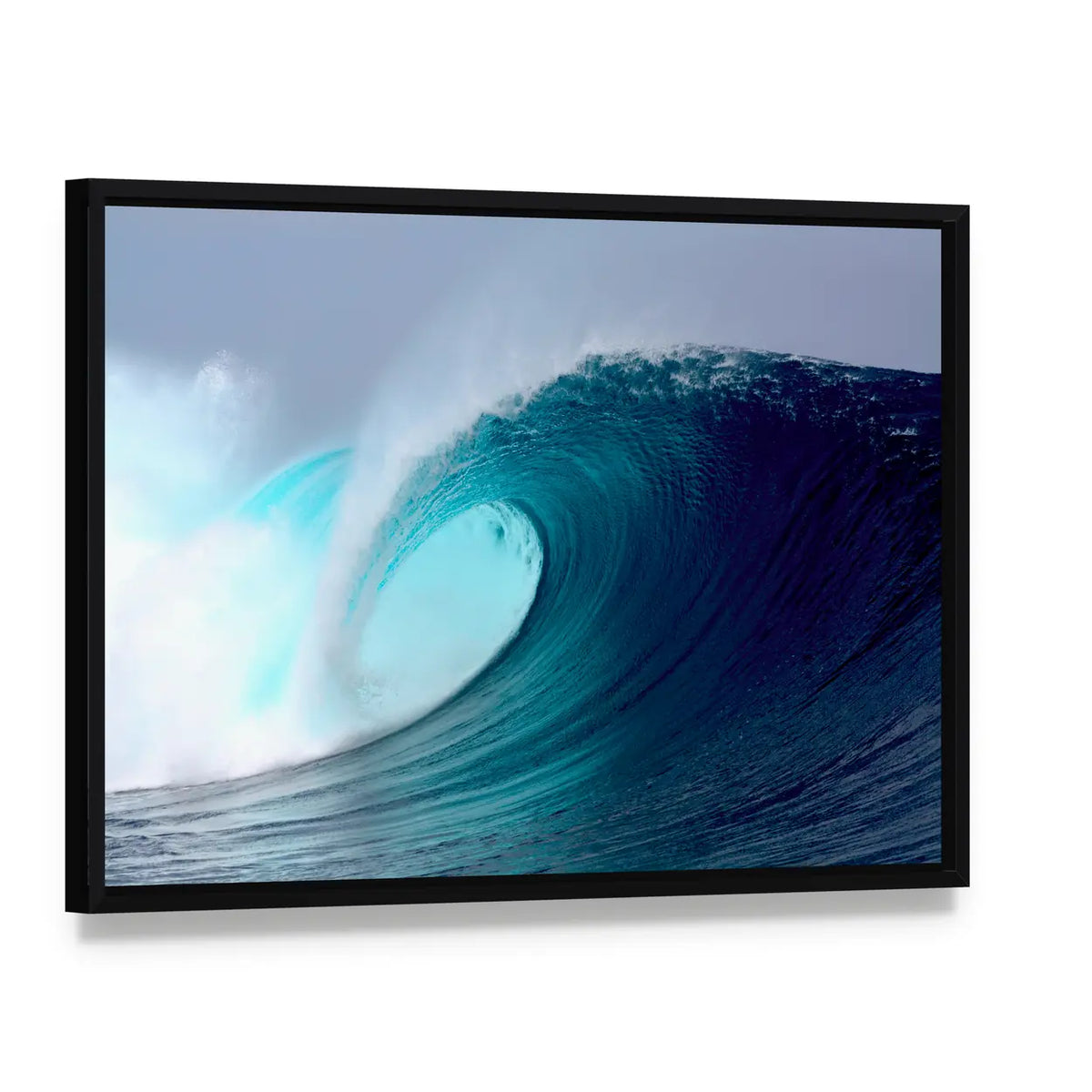 Blue Tropical Surfing Wave Canvas Wall Art, framed canvas in a black floater frame, angled product view