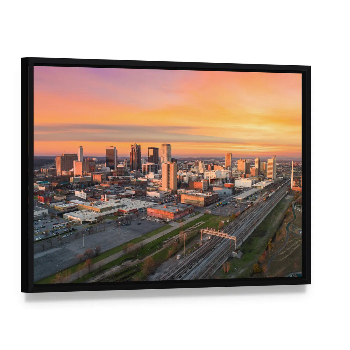 Birmingham Downtown Skyline at Sunset Canvas Wall Art, framed canvas in a black floater frame, angled product view