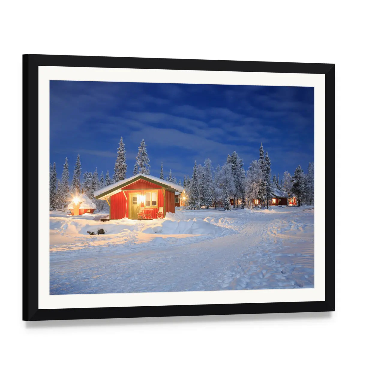 Cozy Winter Cabin at Night Canvas Wall Art, framed print with white mat and black frame, angled product view
