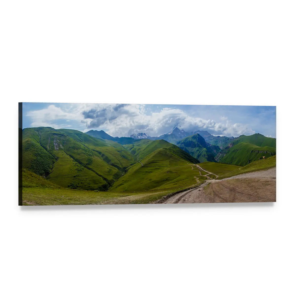 Winding Dirt Road Through Green Mountains Panoramic Canvas Wall Art, single panel gallery wrapped canvas, angled product view