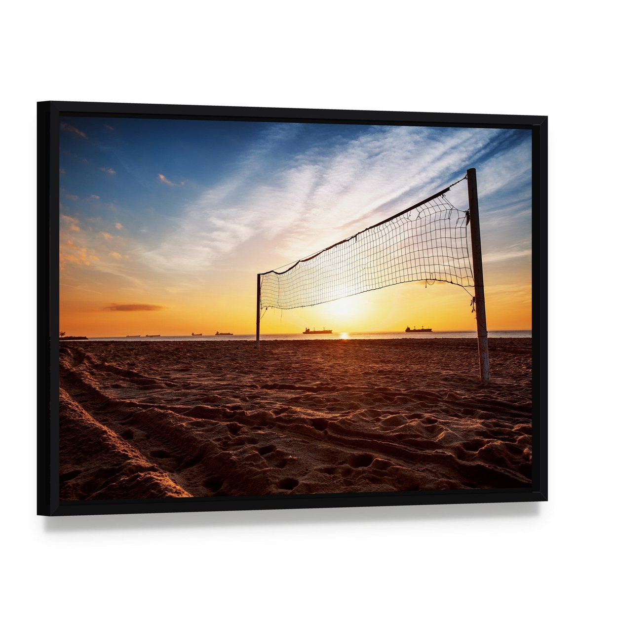 Silhouette of a Volleyball Net and Sunrise on the Beach Canvas Wall Art, framed canvas in a black floater frame, angled product view