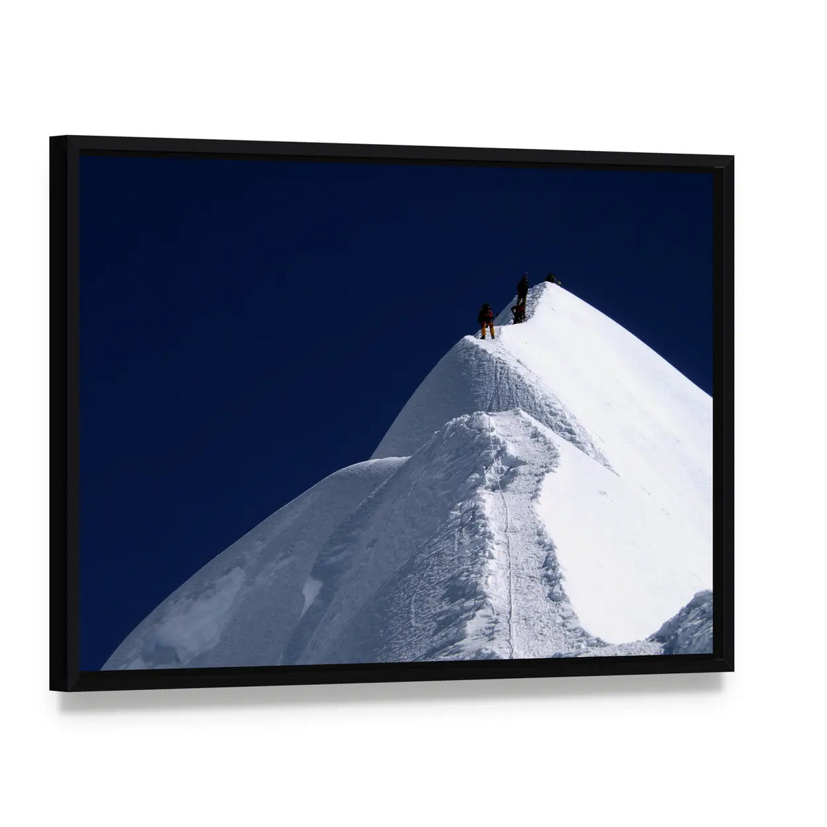 Climbers on Nepal Mountain Peak Canvas Wall Art, framed canvas in a black floater frame, angled product view