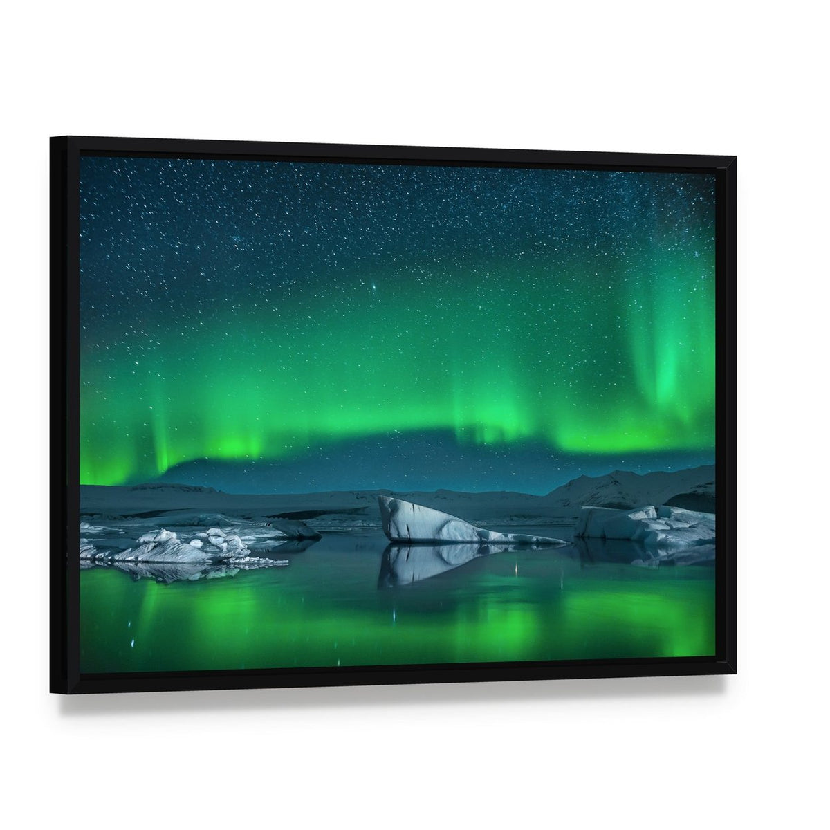 Icebergs Under Northern Lights Canvas Wall Art, framed canvas in a black floater frame, angled product view