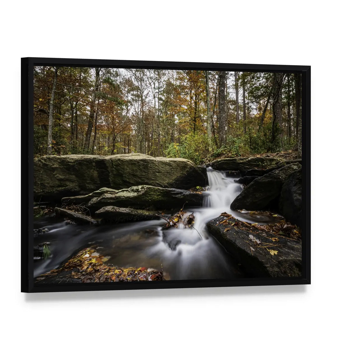 Cheaha Falls in Autumn Canvas Wall Art, framed canvas in a black floater frame, angled product view