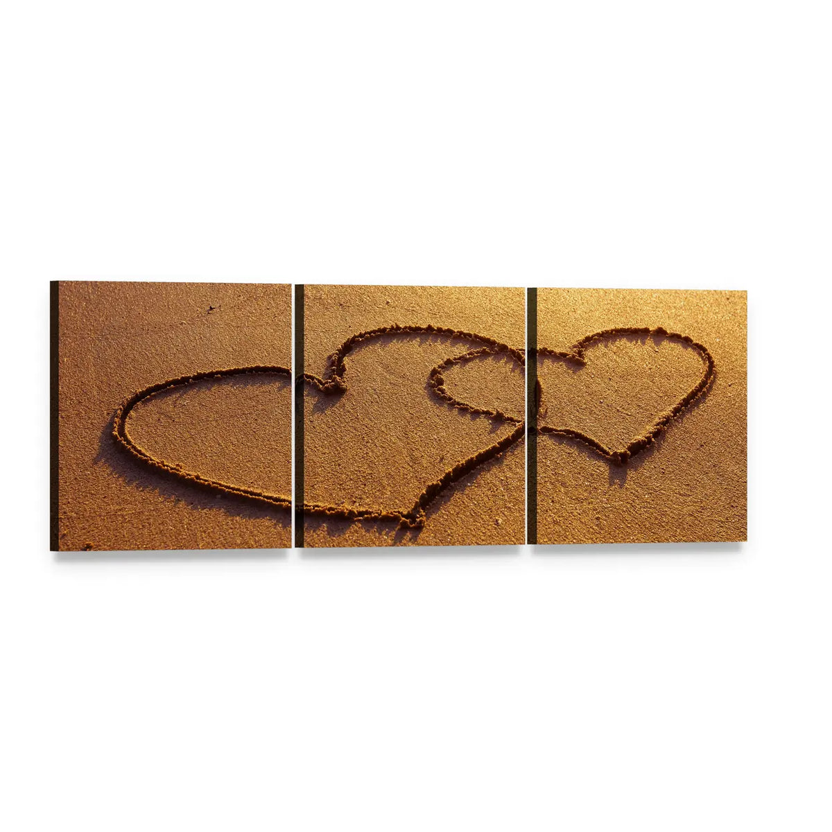 Interlocking Hearts in Sand at Golden Hour Panoramic Canvas Wall Art, 3 panel 3 Piece layout gallery wrapped canvas set, angled product view