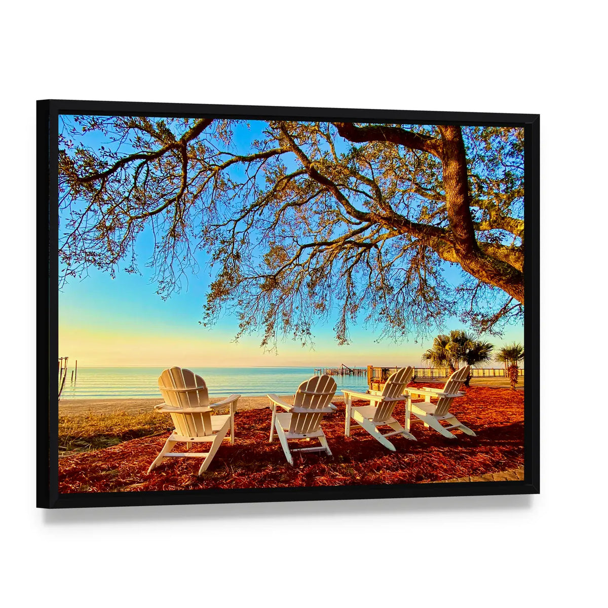 Four White Adirondack Chairs at Sunset Canvas Wall Art, framed canvas in a black floater frame, angled product view