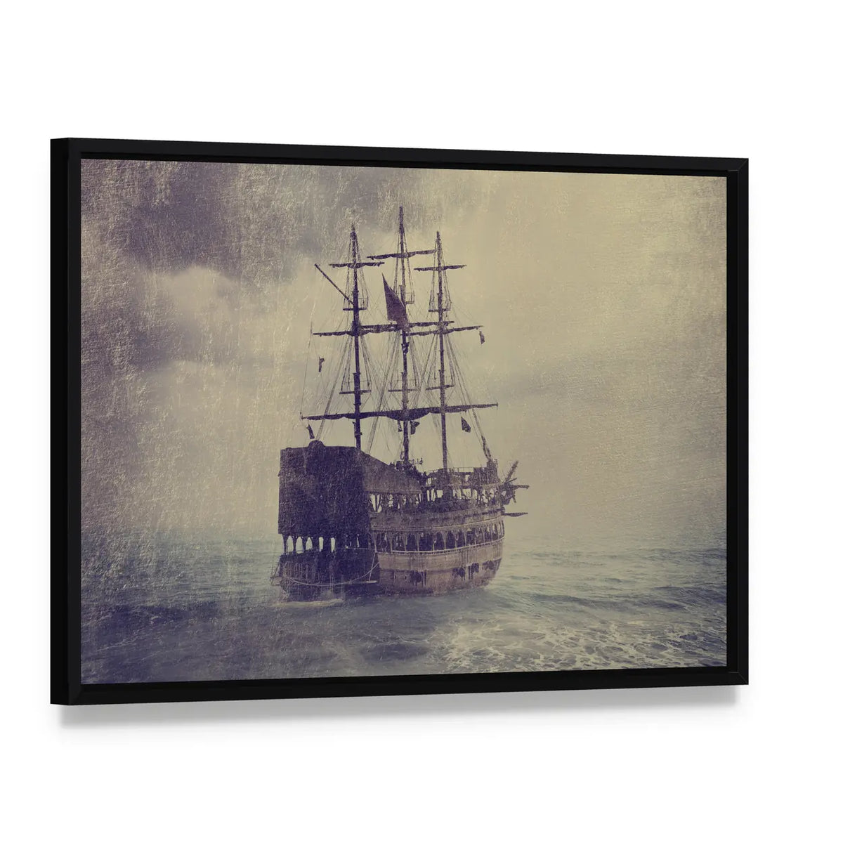 Old Pirate Ship at Sea Canvas Wall Art, framed canvas in a black floater frame, angled product view