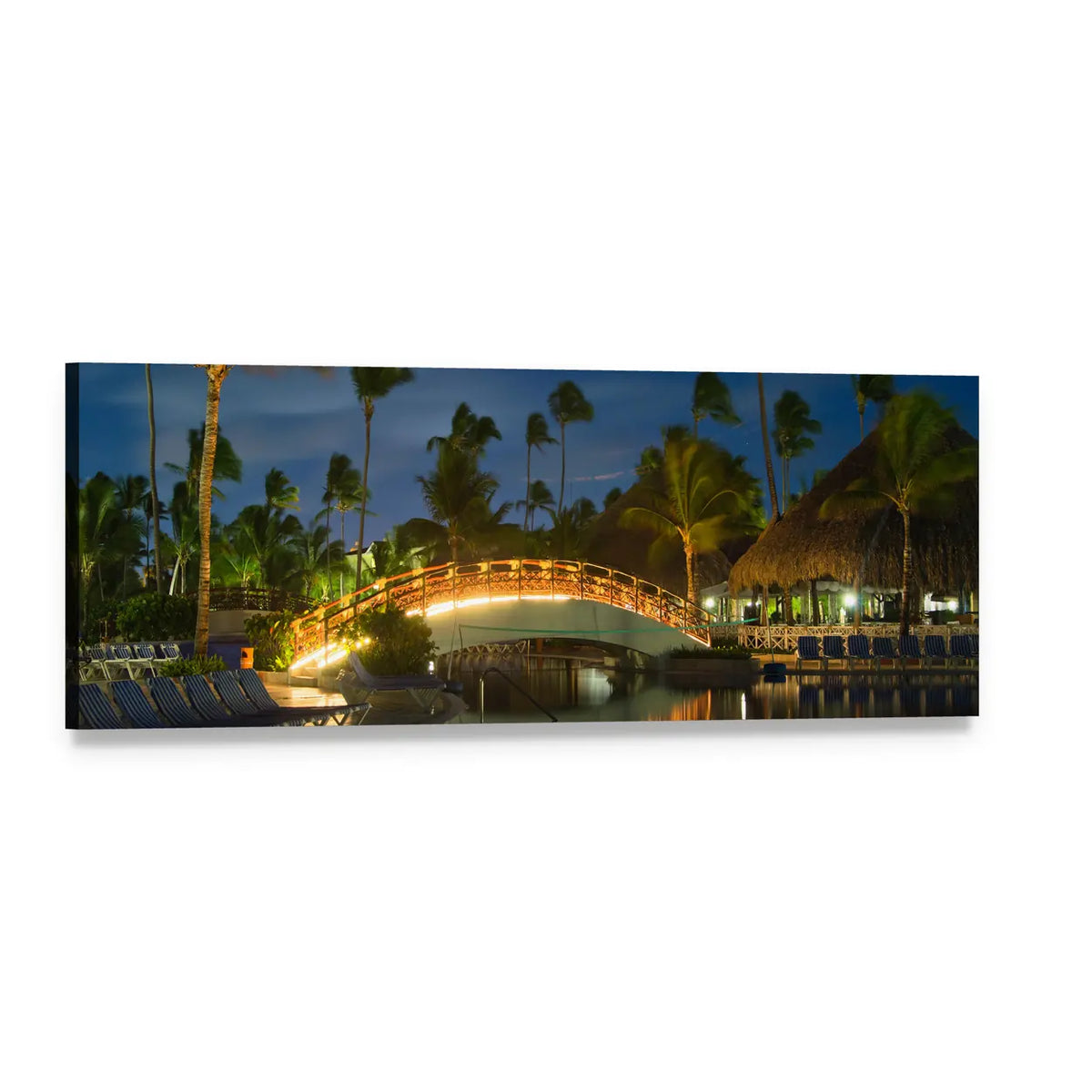 Nightlit Resort Pool with Glowing Bridge Panoramic Canvas Wall Art, single panel gallery wrapped canvas, angled product view