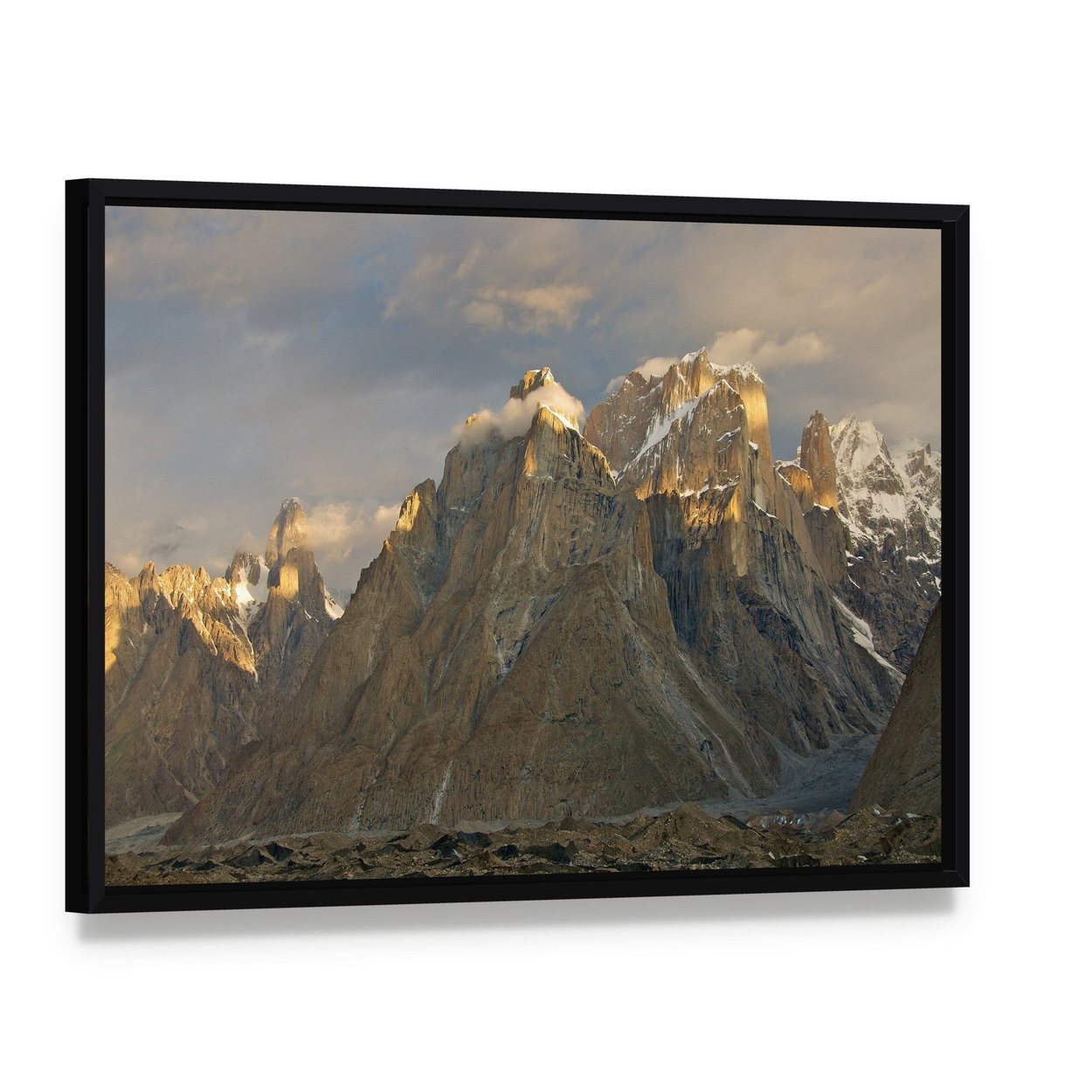 Trango Towers in Evening Light Canvas Wall Art, framed canvas in a black floater frame, angled product view