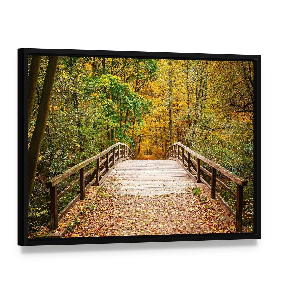 Wooden Bridge in the Autumn Forest Canvas Wall Art, framed canvas in a black floater frame, angled product view