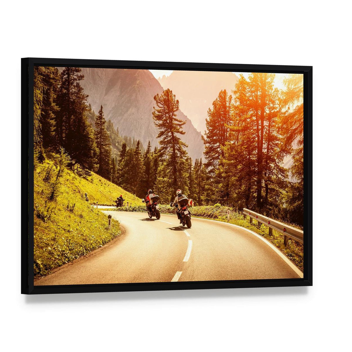 Motorcyclists Riding on a Scenic Road Canvas Wall Art, framed canvas in a black floater frame, angled product view