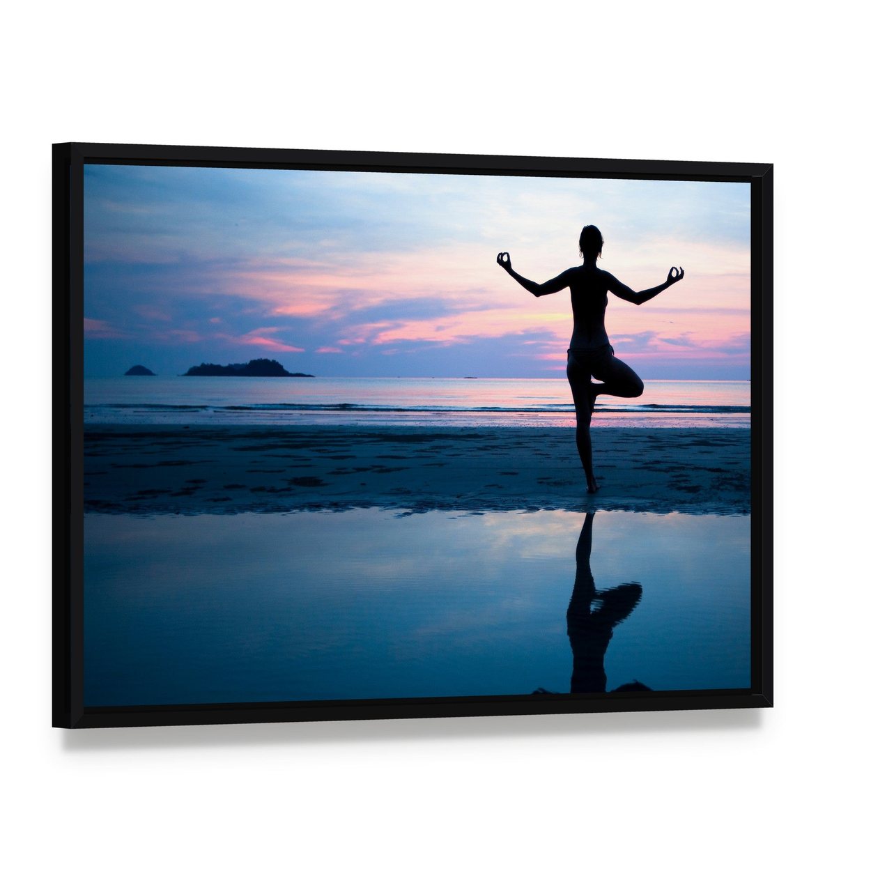 Woman Practicing Yoga on the Beach After Sunset Canvas Wall Art, framed canvas in a black floater frame, angled product view