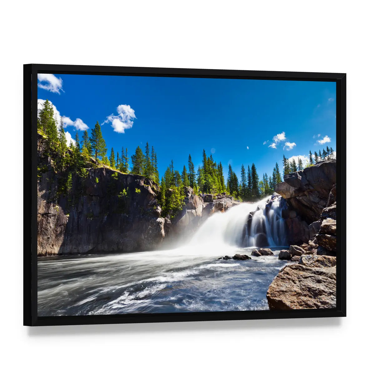 Scenic Waterfall Canvas Wall Art, framed canvas in a black floater frame, angled product view
