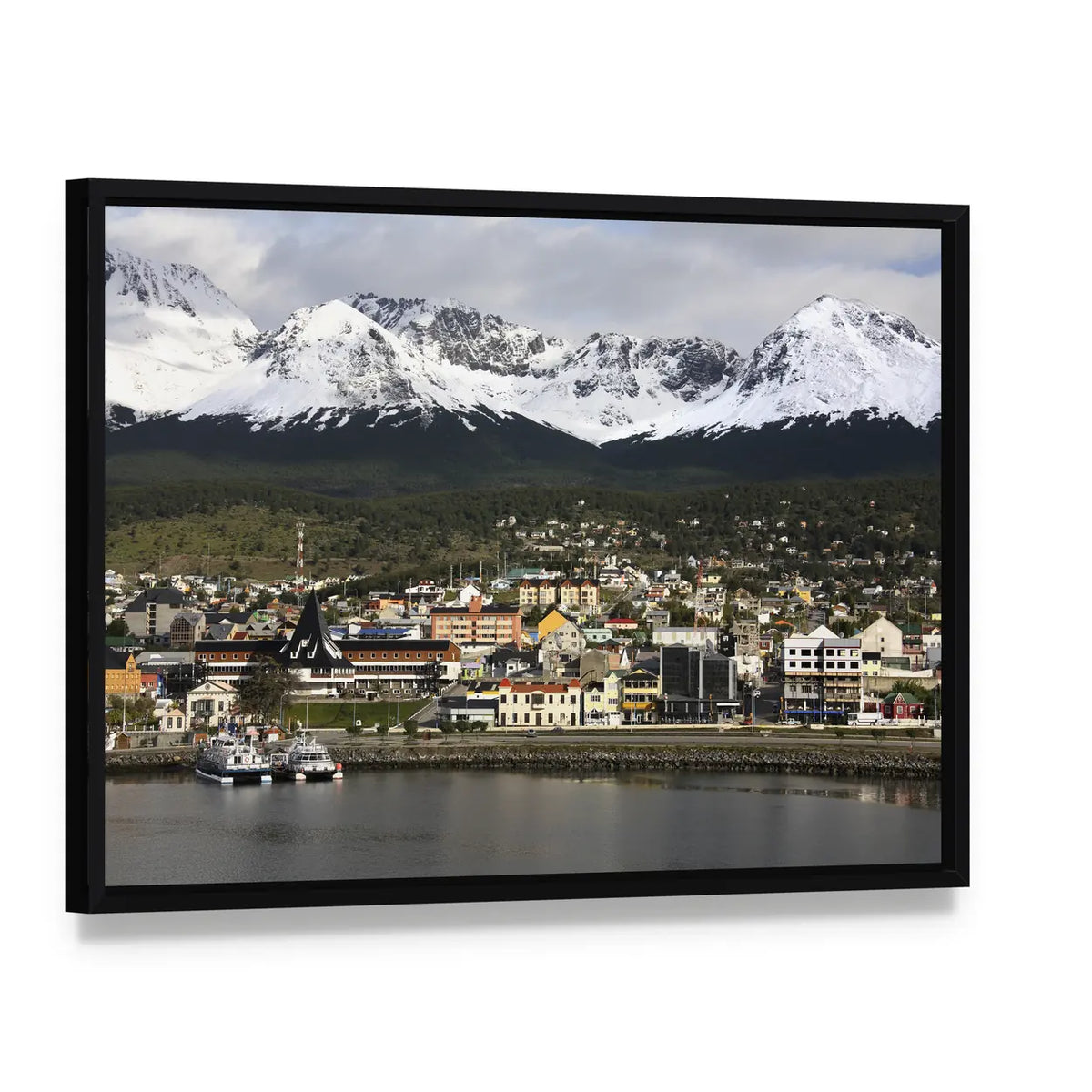 Ushuaia Harbor with Snow-capped Peaks Canvas Wall Art, framed canvas in a black floater frame, angled product view
