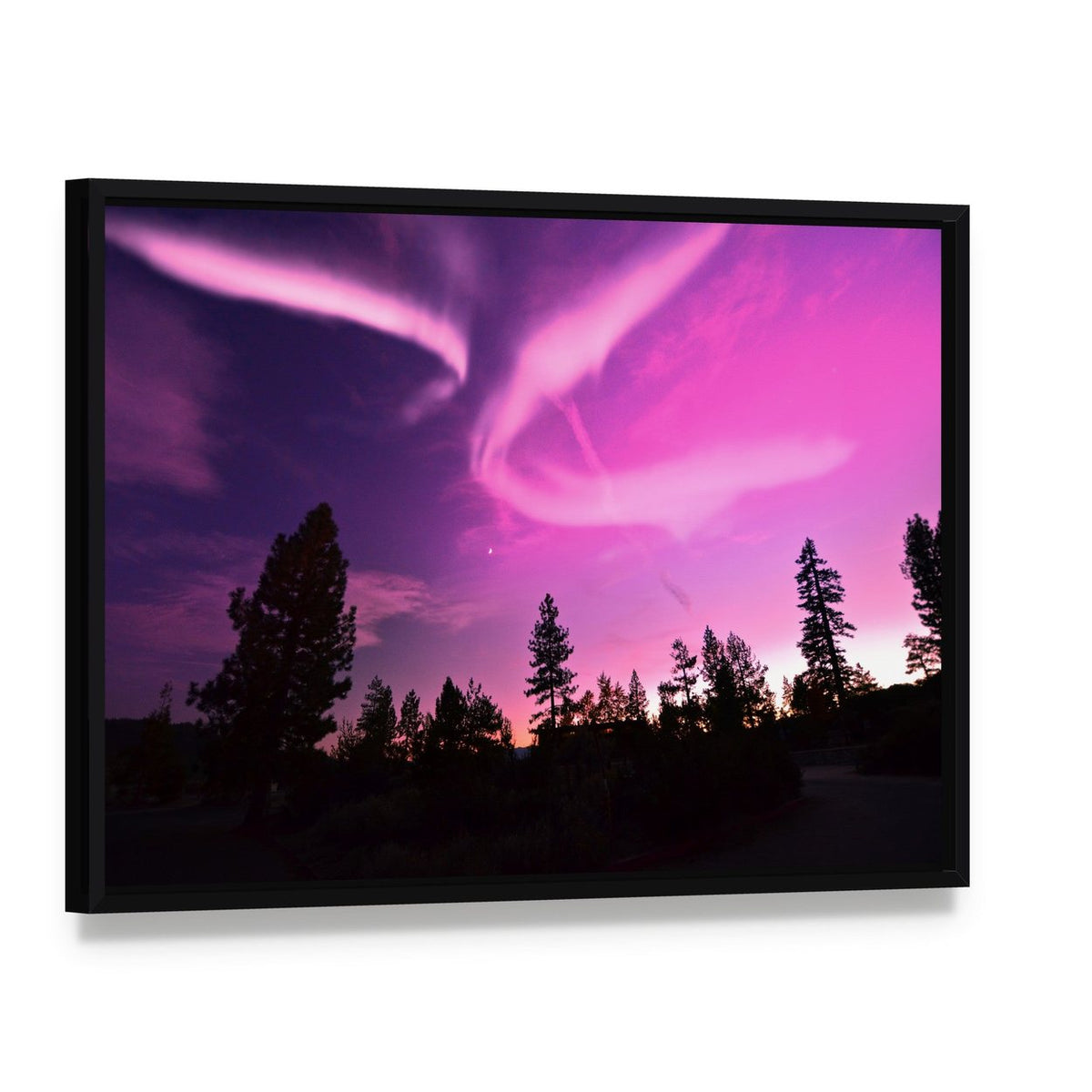 Pink Northern Lights Canvas Wall Art, framed canvas in a black floater frame, angled product view