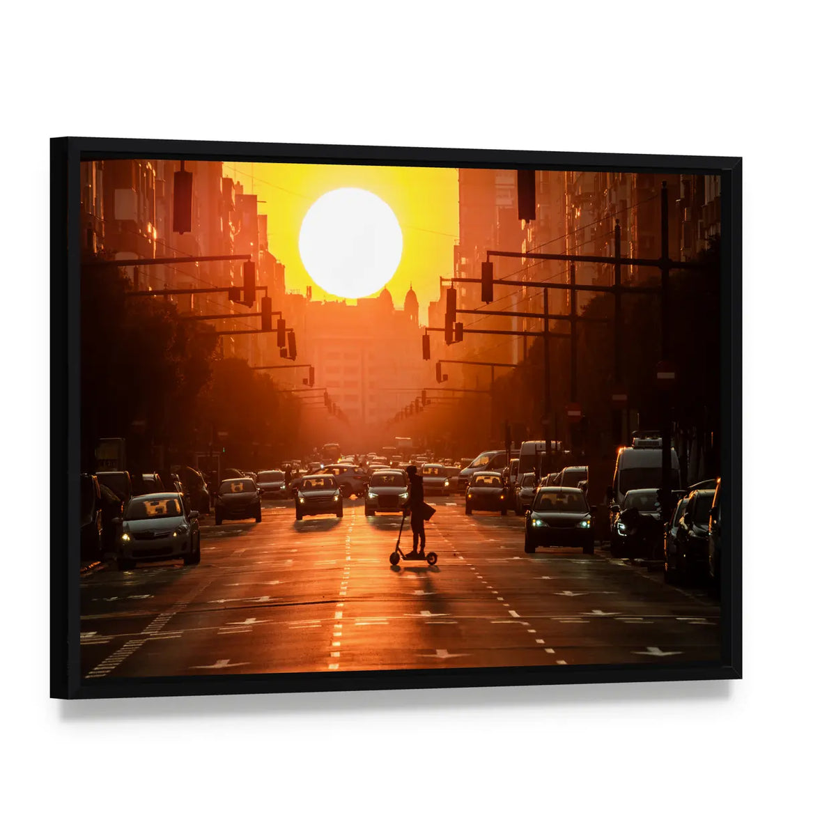 Sunset City Street with Scooter Canvas Wall Art, framed canvas in a black floater frame, angled product view