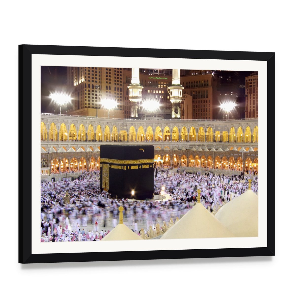 Kaaba at Night Canvas Wall Art, framed print with white mat and black frame, angled product view