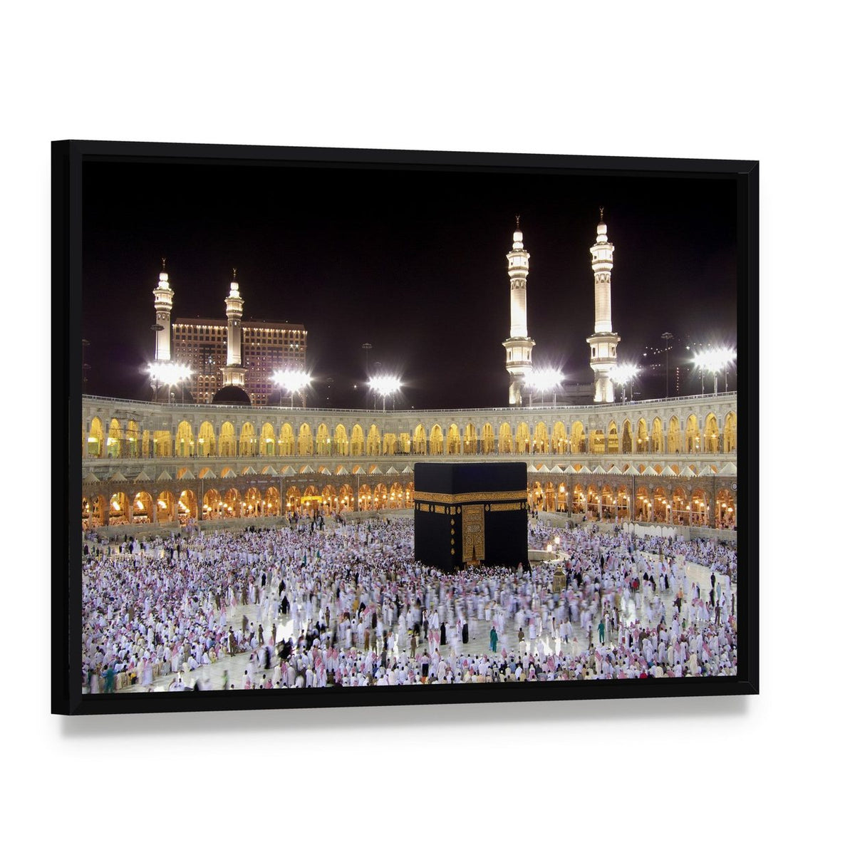 Night View of the Kaaba Canvas Wall Art, framed canvas in a black floater frame, angled product view