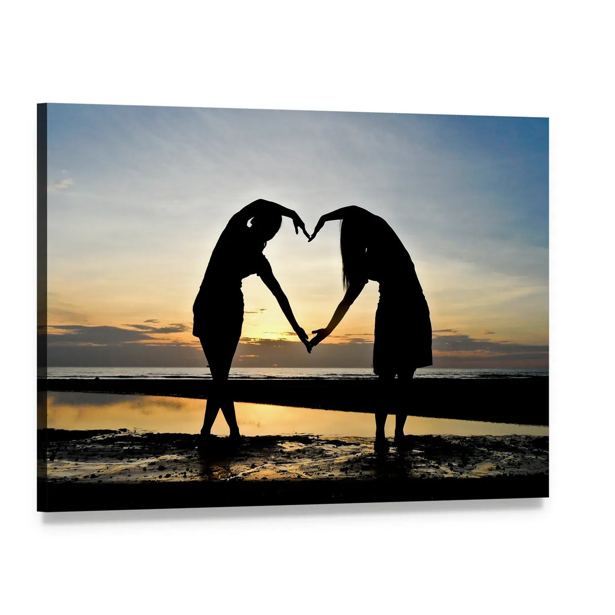 Two Women Forming Heart Silhouette on Beach Canvas Wall Art, single panel gallery wrapped canvas, angled product view