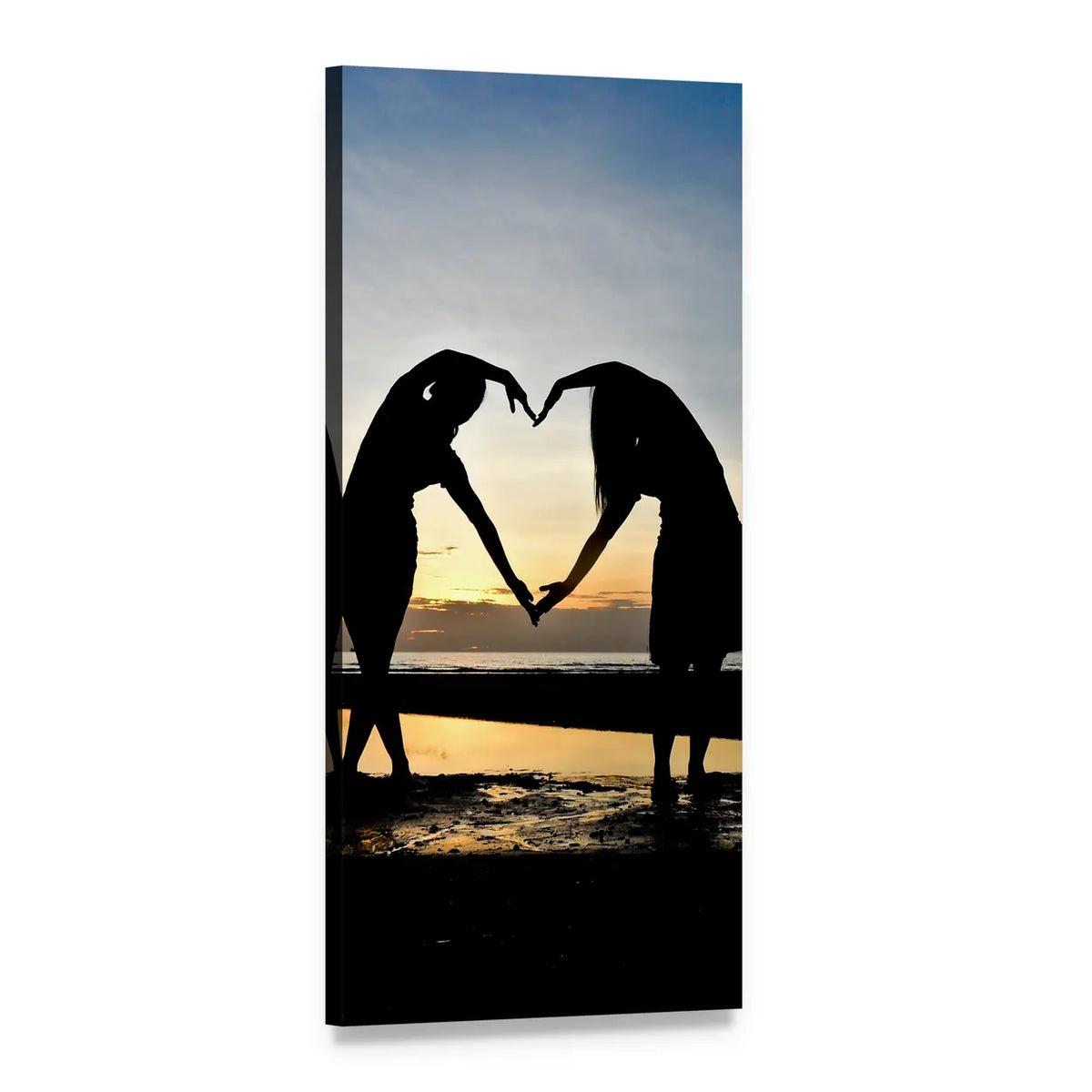 Two Figures Forming Heart on Beach at Sunset Vertical Canvas Wall Art, 1 panel 1 Vertical layout gallery wrapped canvas set, angled product view
