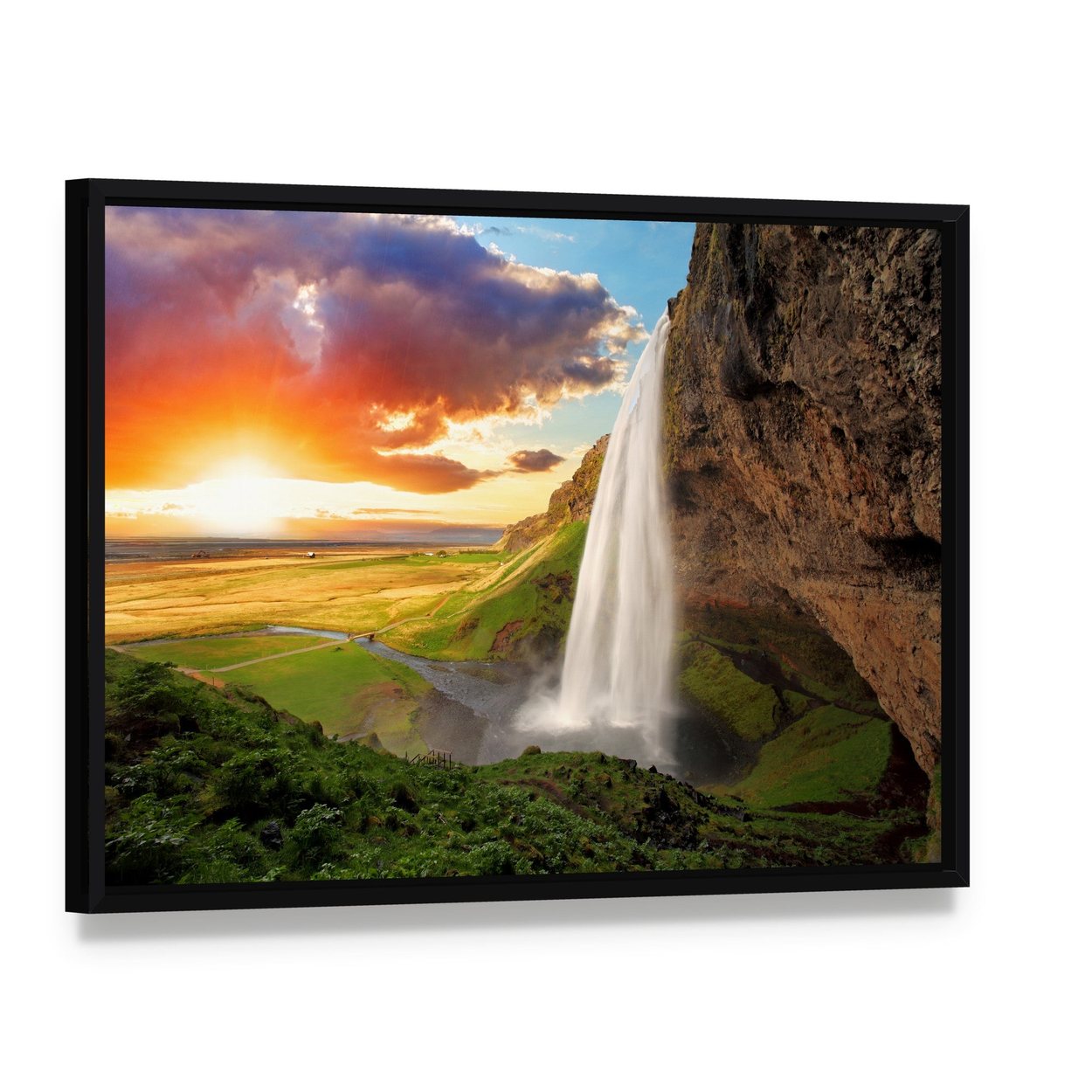 Seljalandsfoss Waterfall Sunset Canvas Wall Art, framed canvas in a black floater frame, angled product view